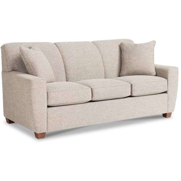 Couch with store attached back cushions